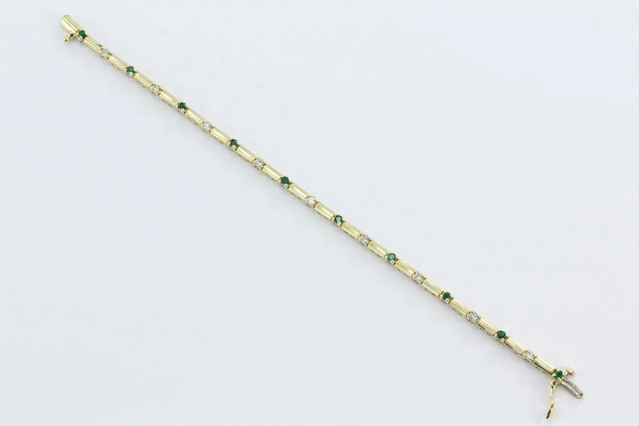 14k Yellow Gold Diamond And Emerald Tennis Bracelet