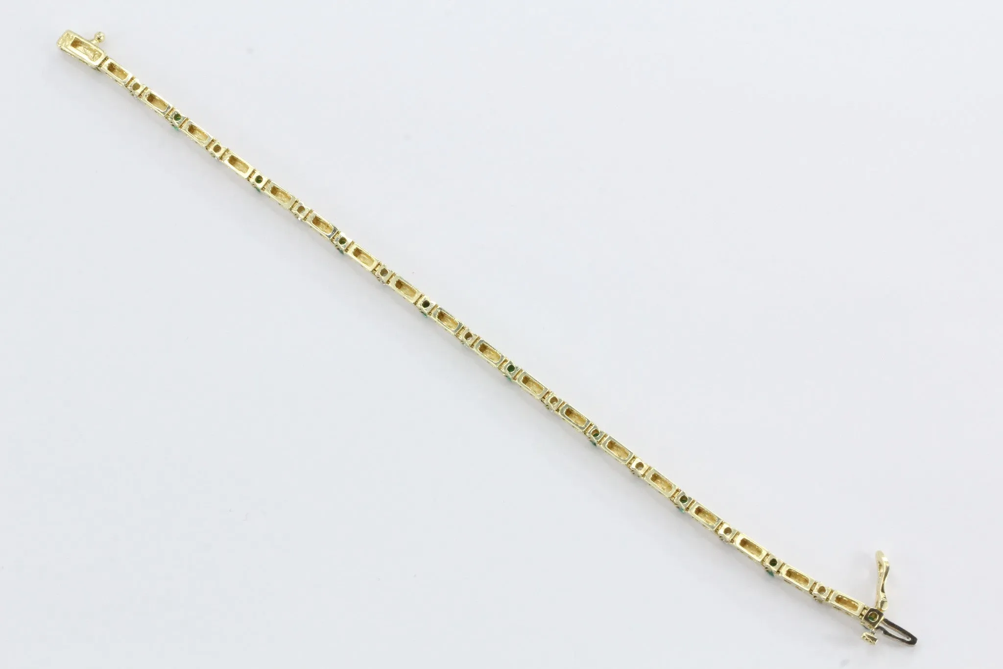 14k Yellow Gold Diamond And Emerald Tennis Bracelet