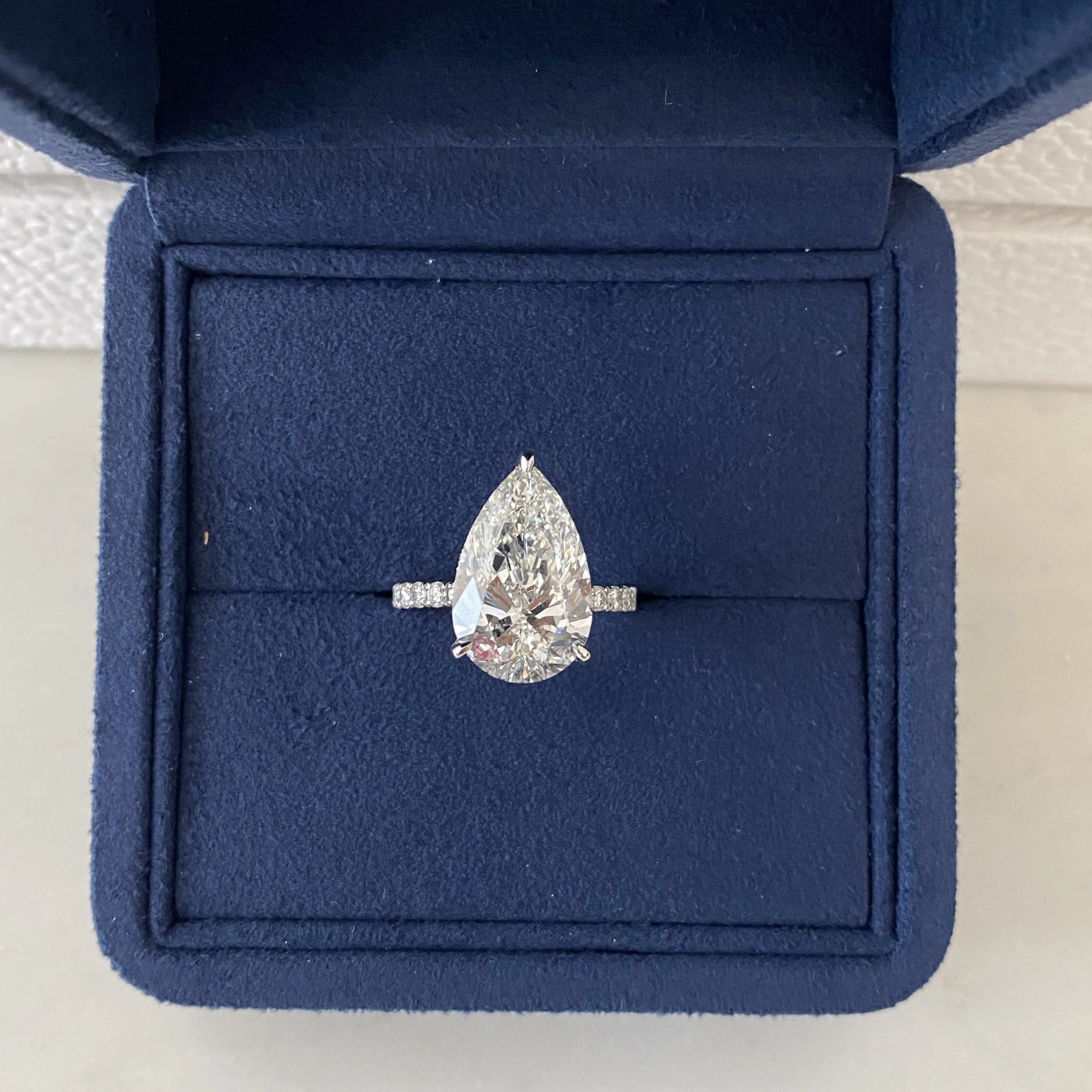6ct Pear Shape, Hidden Halo, Pavé Engagement Ring