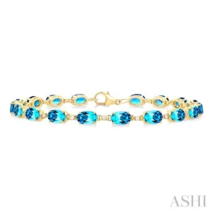 6X4 MM Oval Cut Blue Topaz and 1/6 ctw Round Cut Diamond Semi Precious Tennis Bracelet in 10K Yellow Gold