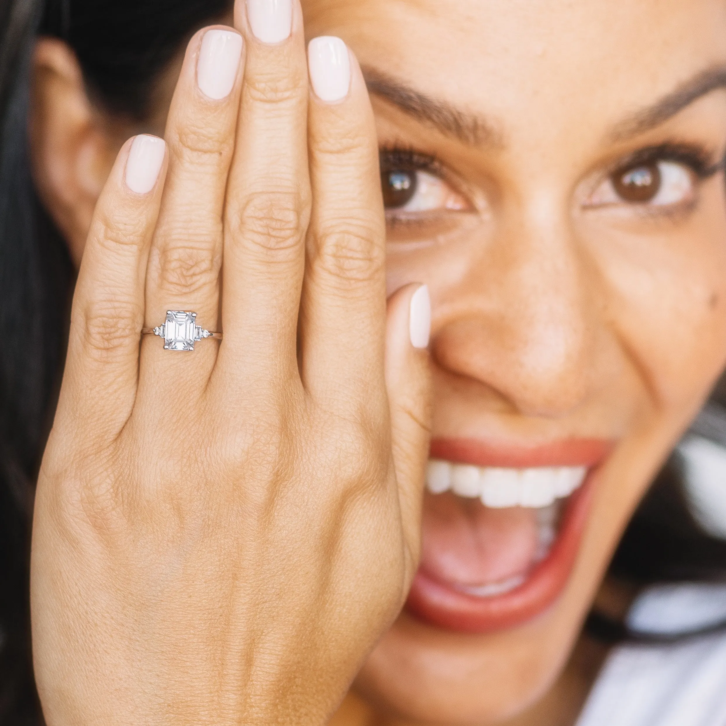 Emerald Cut and Baguette Diamond Engagement Ring