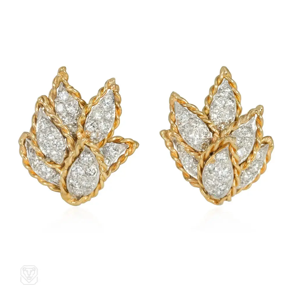 Gold and diamond earrings of overlapping leaf design