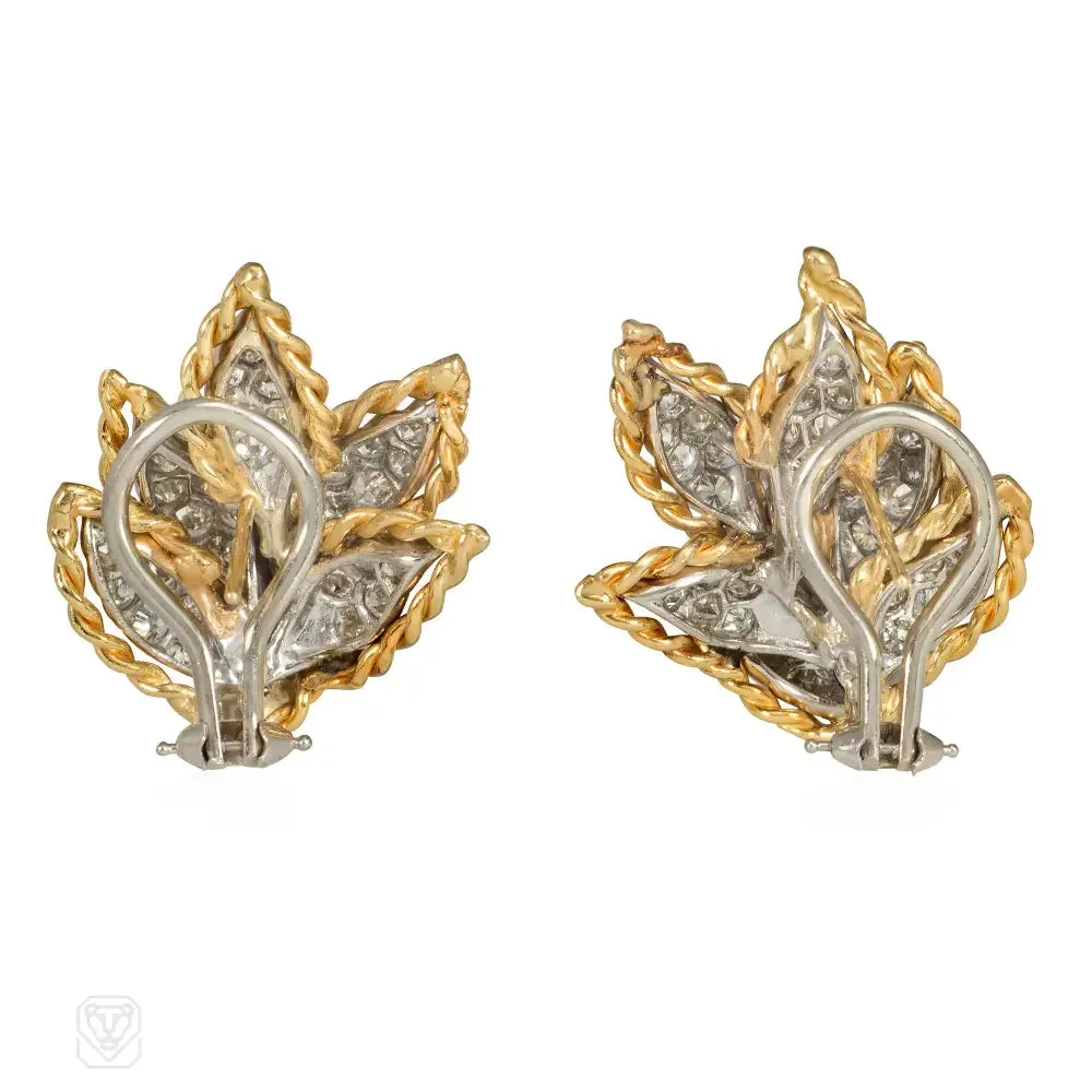 Gold and diamond earrings of overlapping leaf design