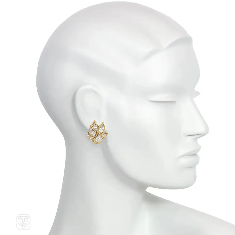 Gold and diamond earrings of overlapping leaf design