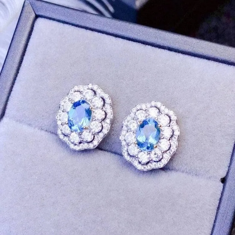 Oval Cut Natural Blue Topaz Stud Earrings