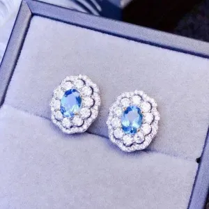 Oval Cut Natural Blue Topaz Stud Earrings