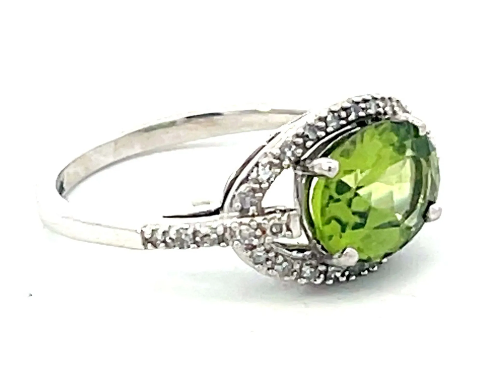 Oval Green Peridot and Diamond Halo Ring in 14k White Gold