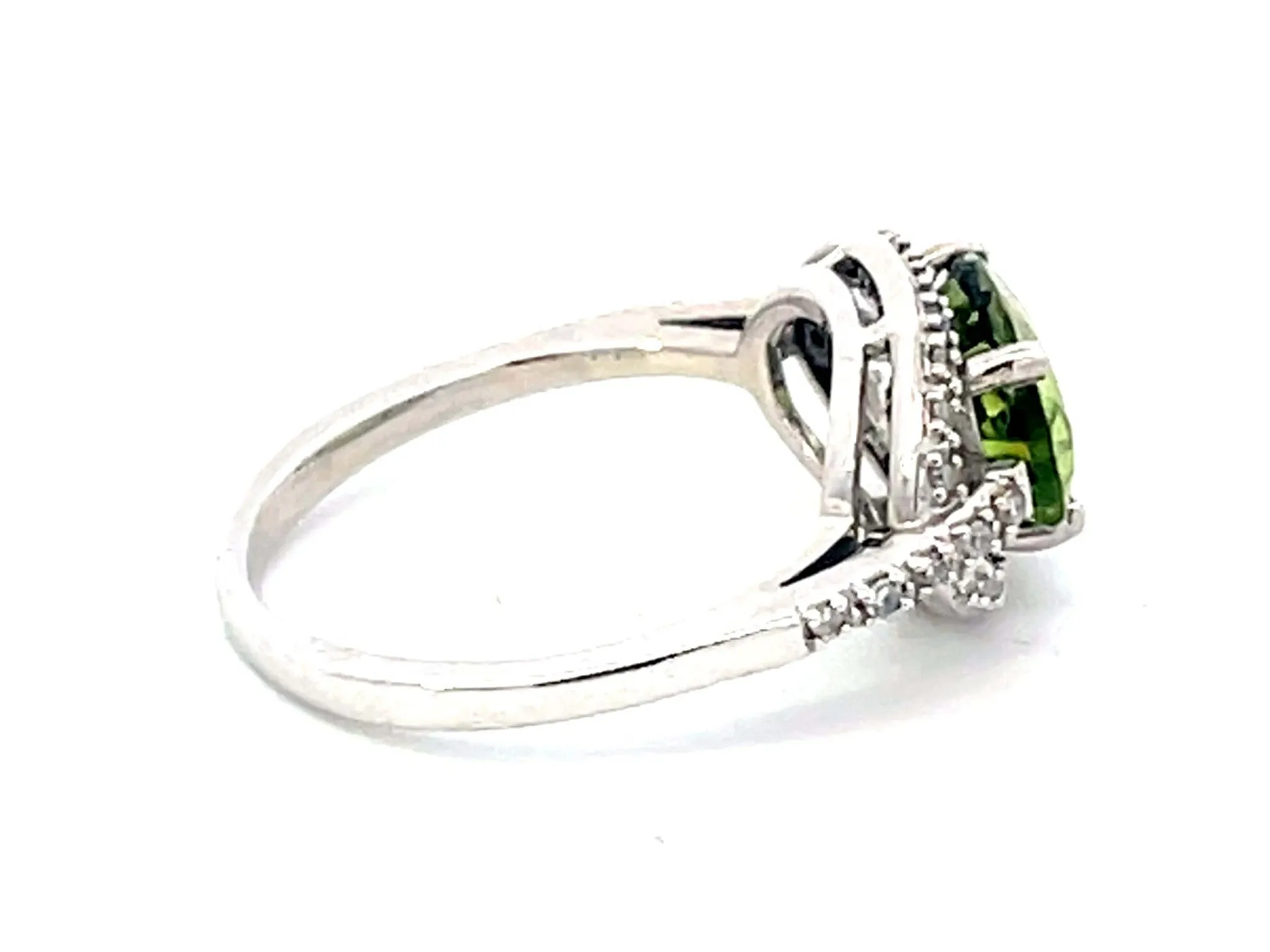 Oval Green Peridot and Diamond Halo Ring in 14k White Gold