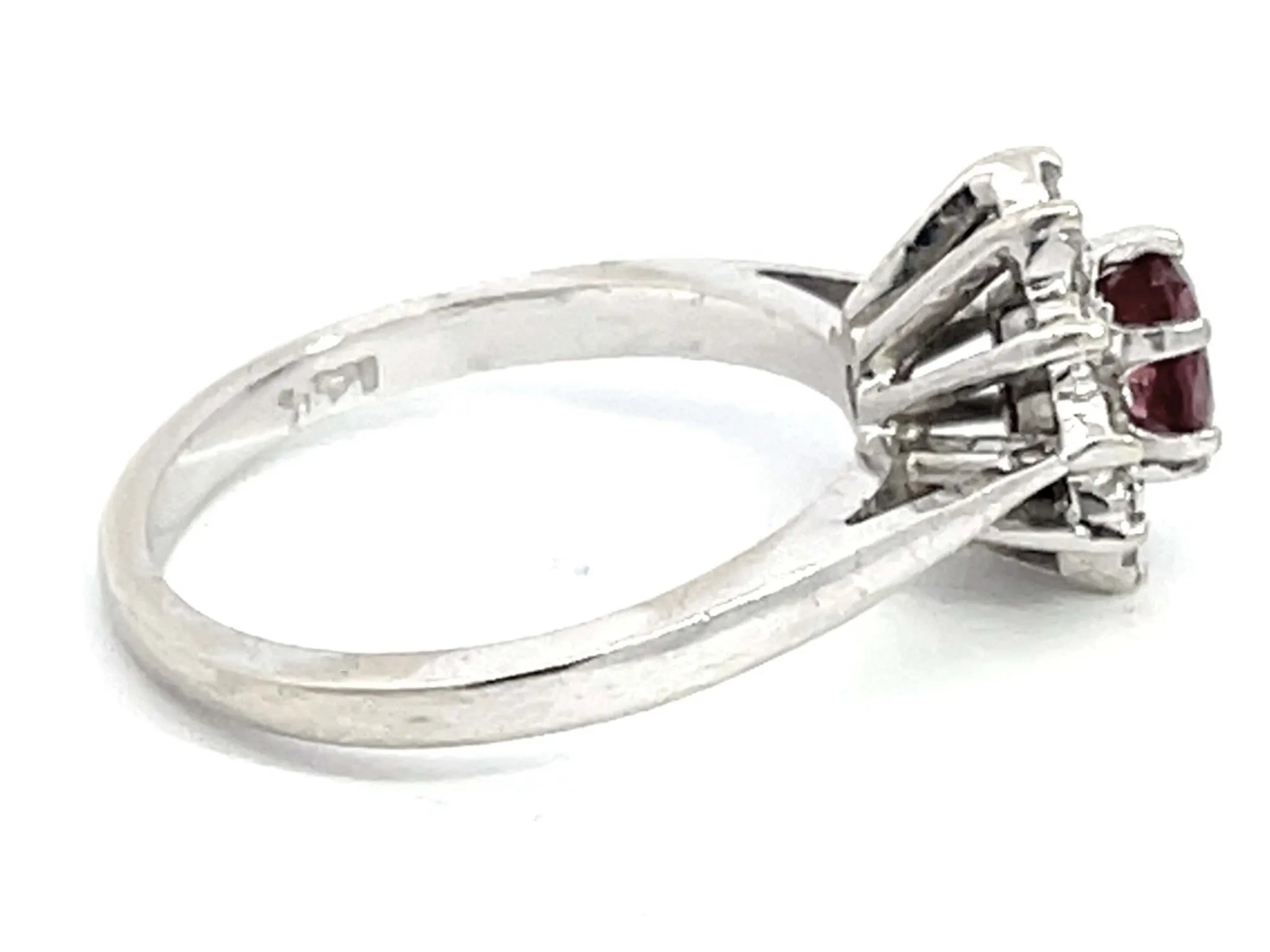 Oval Ruby and Diamond Halo Ring in 14k White Gold