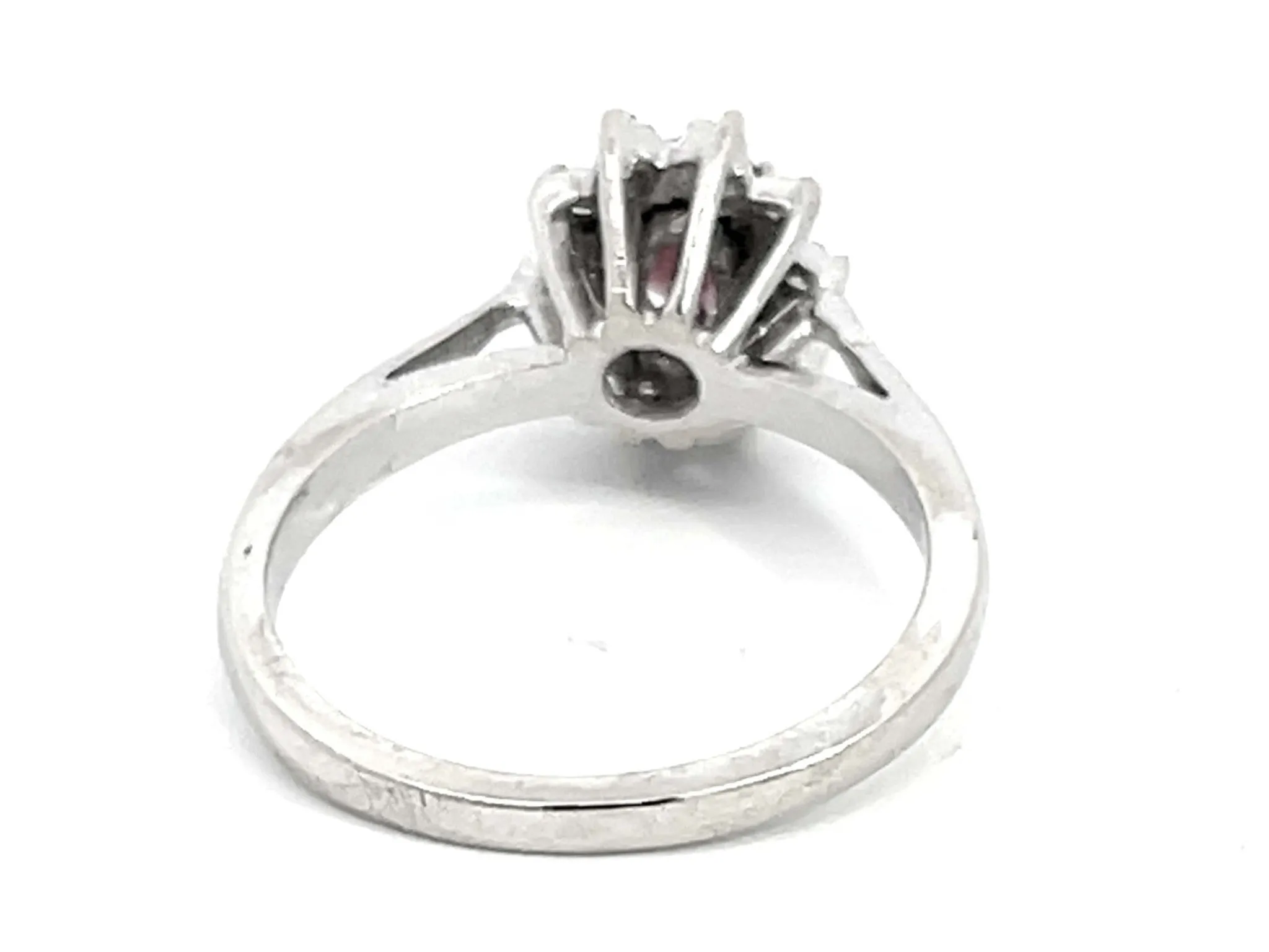 Oval Ruby and Diamond Halo Ring in 14k White Gold