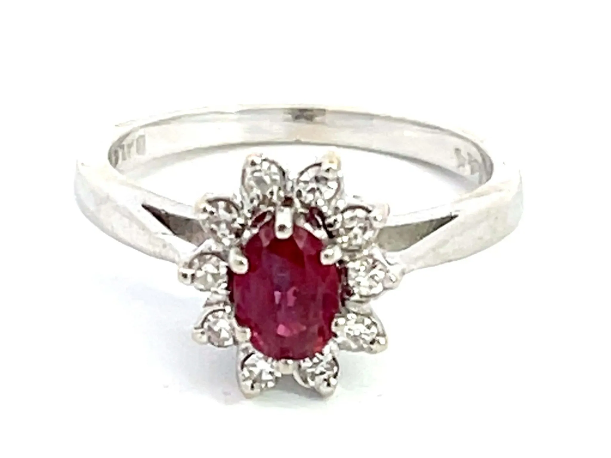 Oval Ruby and Diamond Halo Ring in 14k White Gold