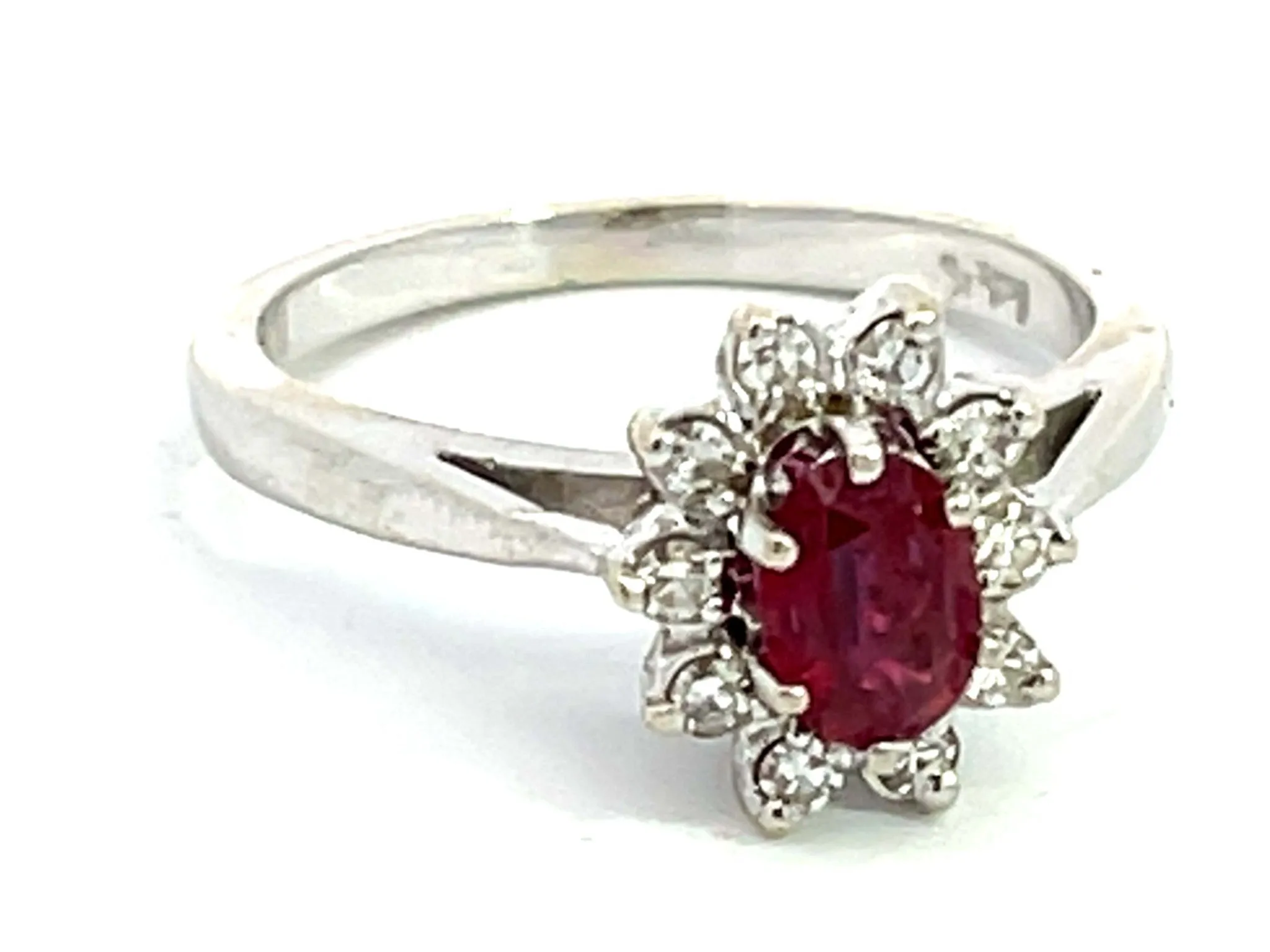 Oval Ruby and Diamond Halo Ring in 14k White Gold