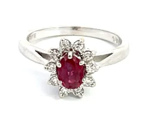 Oval Ruby and Diamond Halo Ring in 14k White Gold