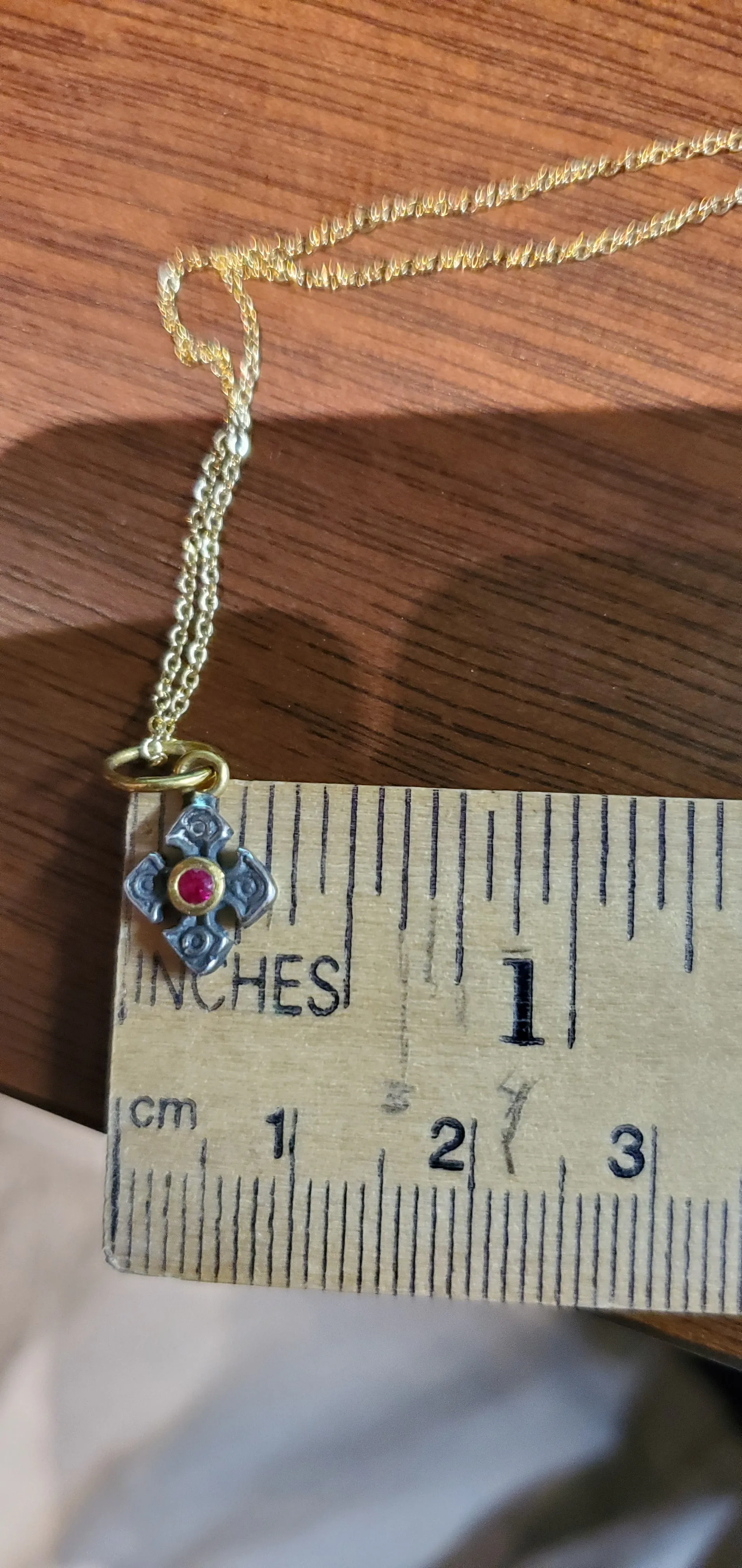 Prehistoric Works Sterling Silver Mini Pontus Cross with a ruby set in 24K gold