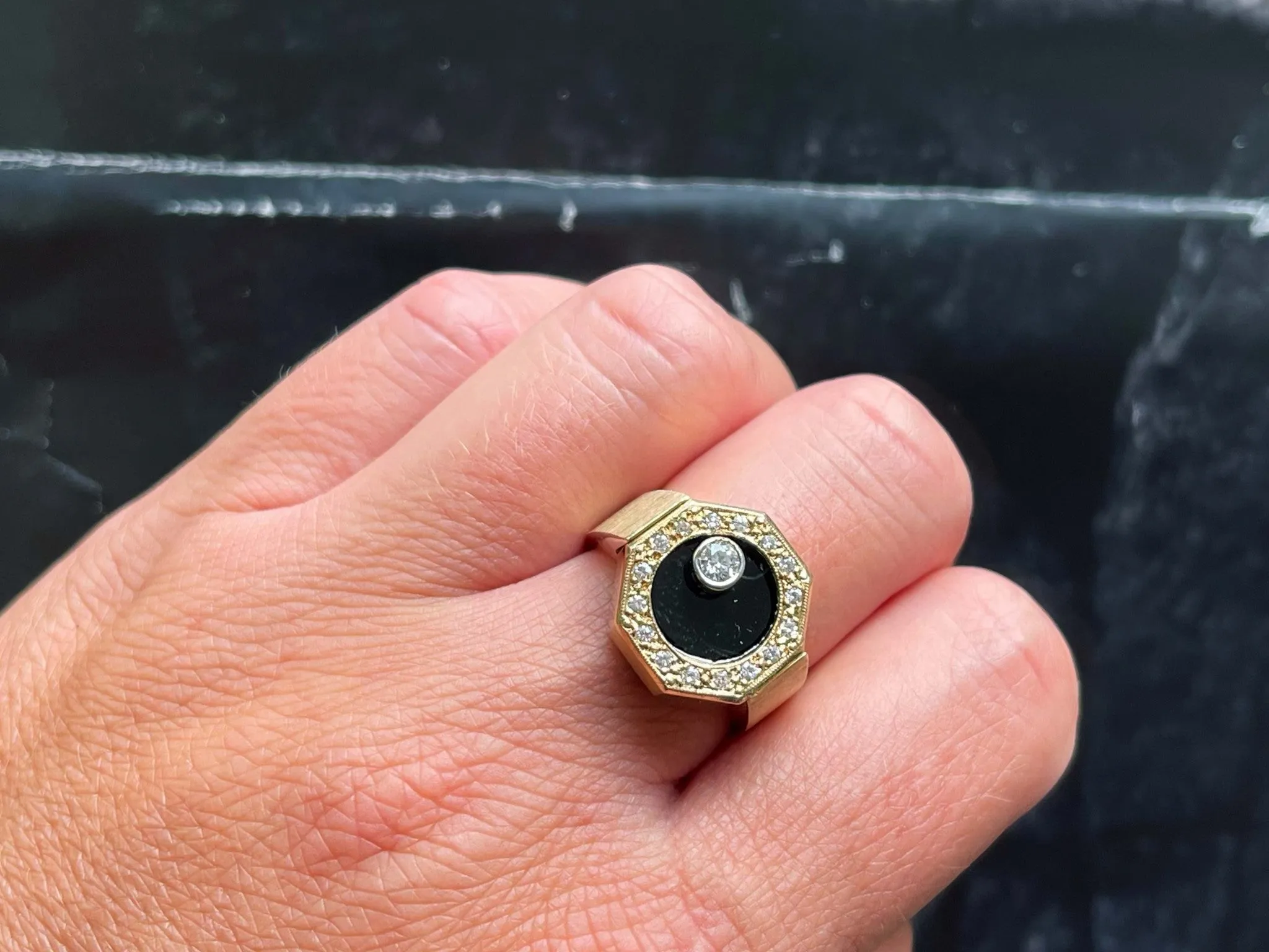 Rotating Diamond Ring on Black Onyx with Diamond Halo in 14k Yellow Gold